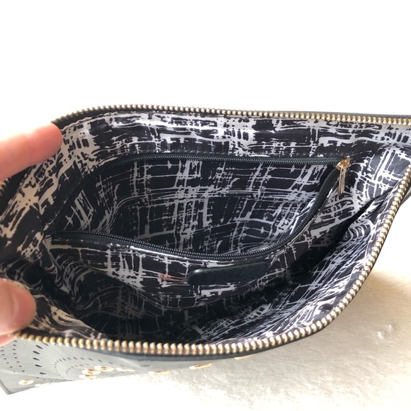 Imoshion Grommet Laser-Cut Design Large Wristlet - Picture 7 of 8